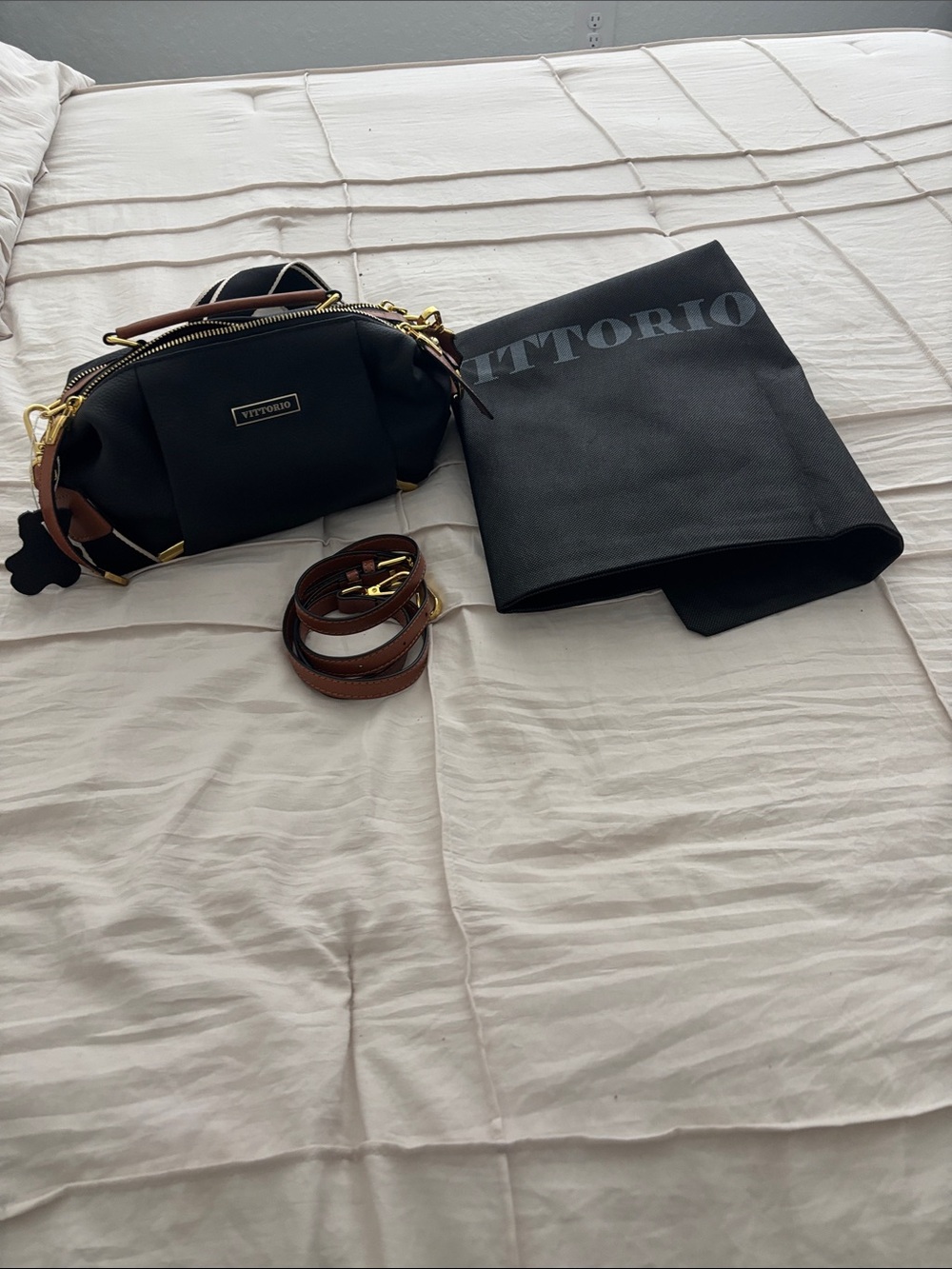 Vittorio Black Pebbled Leather Crossbody with Gold Accents